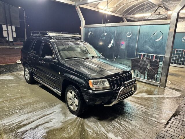 Черный Джип Гранд Чероки, объемом двигателя 2.7 л и пробегом 362 тыс. км за 4200 $, фото 1 на Automoto.ua