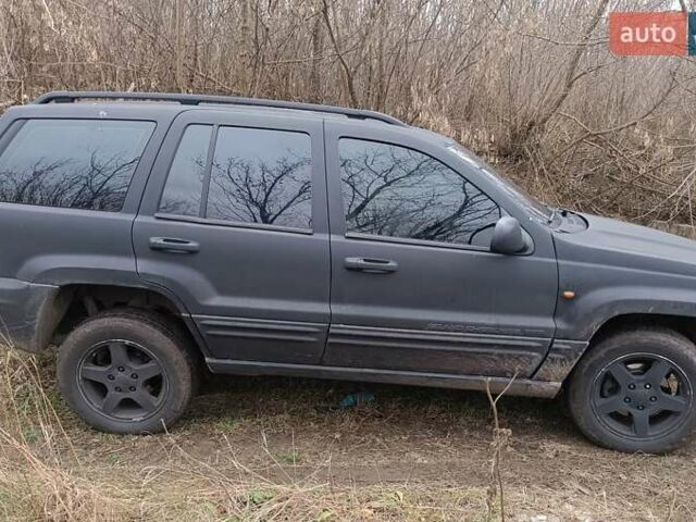 Черный Джип Гранд Чероки, объемом двигателя 2.69 л и пробегом 380 тыс. км за 4700 $, фото 1 на Automoto.ua