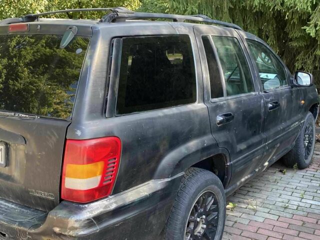 Черный Джип Гранд Чероки, объемом двигателя 2.69 л и пробегом 280 тыс. км за 3100 $, фото 3 на Automoto.ua