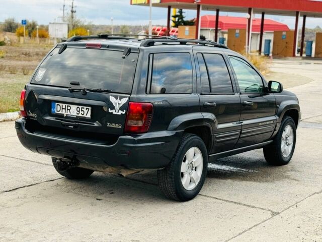 Джип Гранд Чероки 2003 в Синельниковом на Automoto.ua Черный Джип Гранд Чероки, объемом двигателя 3 л и пробегом 204 тыс. км за 3674 $, фото 3 на Automoto.ua