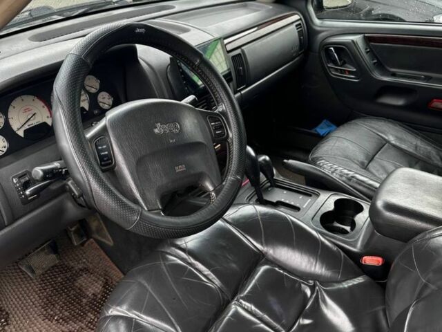 Черный Джип Гранд Чероки, объемом двигателя 2.7 л и пробегом 3 тыс. км за 4500 $, фото 5 на Automoto.ua