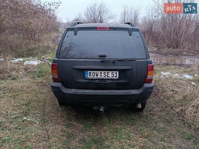 Черный Джип Гранд Чероки, объемом двигателя 2.69 л и пробегом 380 тыс. км за 4700 $, фото 8 на Automoto.ua