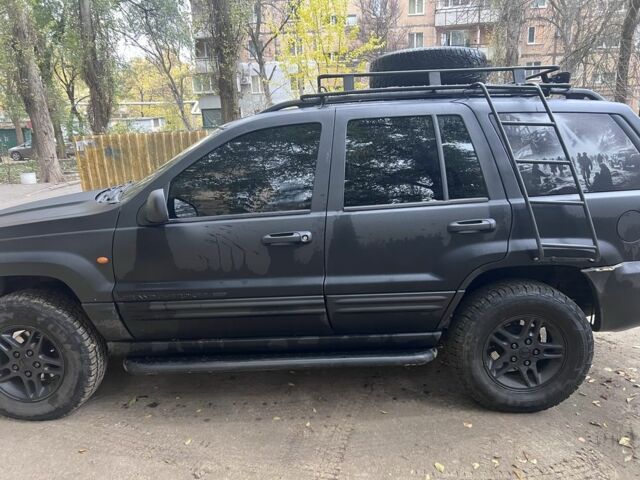 Черный Джип Гранд Чероки, объемом двигателя 2.7 л и пробегом 283 тыс. км за 6000 $, фото 1 на Automoto.ua