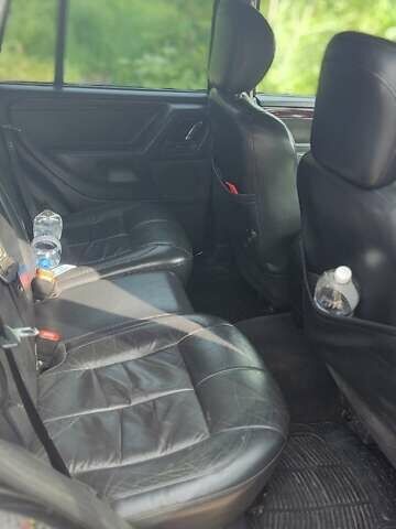 Черный Джип Гранд Чероки, объемом двигателя 2.7 л и пробегом 250 тыс. км за 5600 $, фото 4 на Automoto.ua