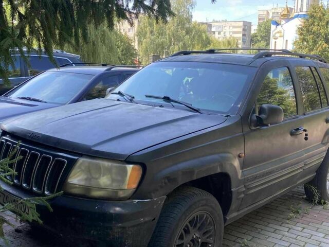 Черный Джип Гранд Чероки, объемом двигателя 2.69 л и пробегом 280 тыс. км за 3100 $, фото 1 на Automoto.ua