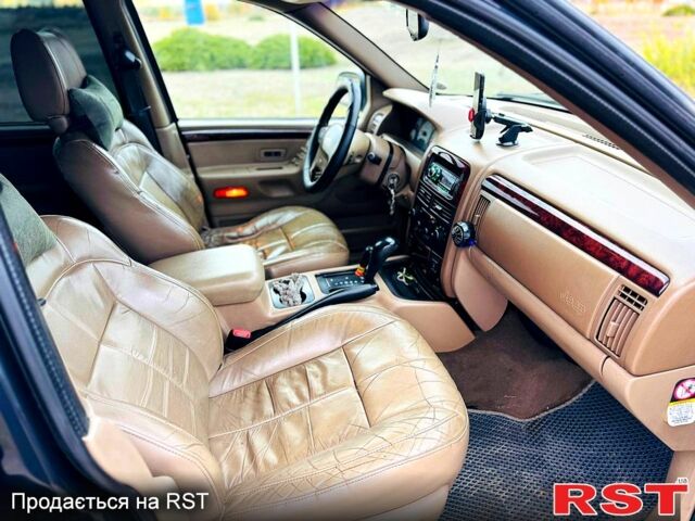 Джип Гранд Чероки 2003 в Новомосковске на Automoto.ua Черный Джип Гранд Чероки, объемом двигателя 3 л и пробегом 204 тыс. км за 3670 $, фото 6 на Automoto.ua