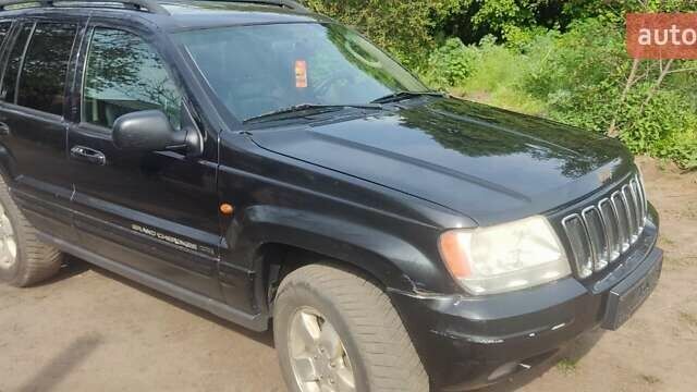 Черный Джип Гранд Чероки, объемом двигателя 2.7 л и пробегом 250 тыс. км за 5600 $, фото 7 на Automoto.ua