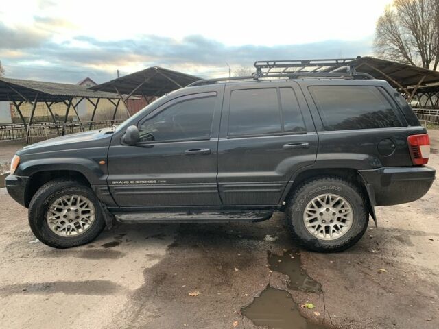 Черный Джип Гранд Чероки, объемом двигателя 2.7 л и пробегом 240 тыс. км за 5500 $, фото 5 на Automoto.ua