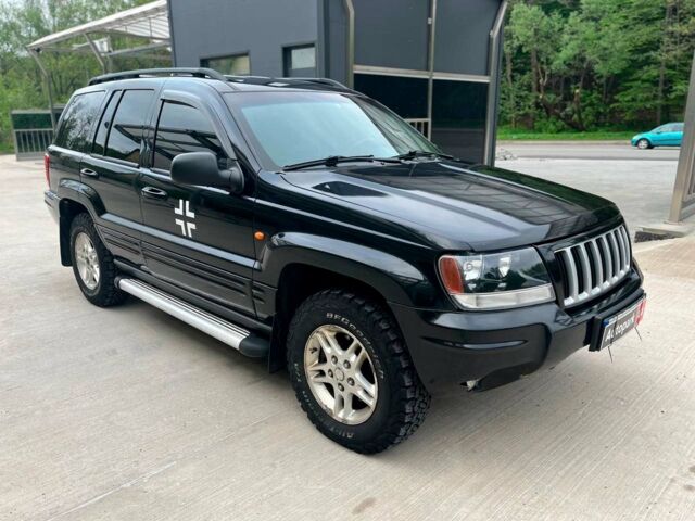 Чорний Джип Grand Cherokee, об'ємом двигуна 2.7 л та пробігом 316 тис. км за 8990 $, фото 1 на Automoto.ua