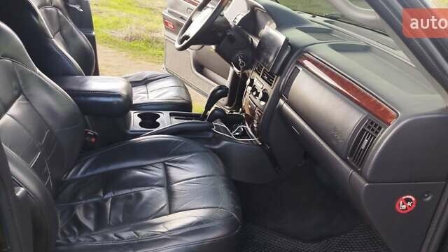 Чорний Джип Grand Cherokee, об'ємом двигуна 2.69 л та пробігом 270 тис. км за 9350 $, фото 2 на Automoto.ua