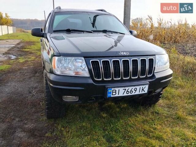 Черный Джип Гранд Чероки, объемом двигателя 2.69 л и пробегом 240 тыс. км за 9000 $, фото 1 на Automoto.ua