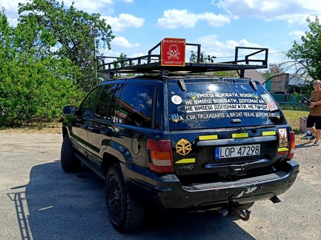Чорний Джип Grand Cherokee, об'ємом двигуна 2.7 л та пробігом 335 тис. км за 5000 $, фото 2 на Automoto.ua