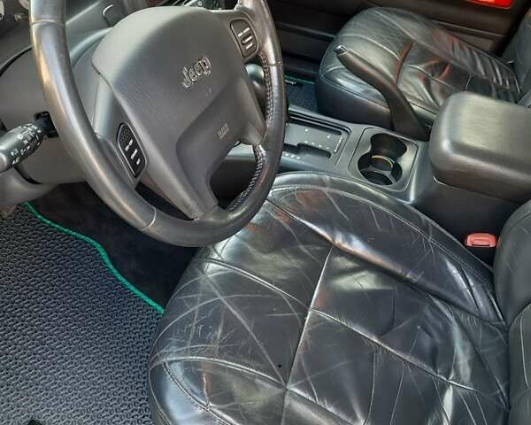 Черный Джип Гранд Чероки, объемом двигателя 2.69 л и пробегом 240 тыс. км за 9000 $, фото 7 на Automoto.ua