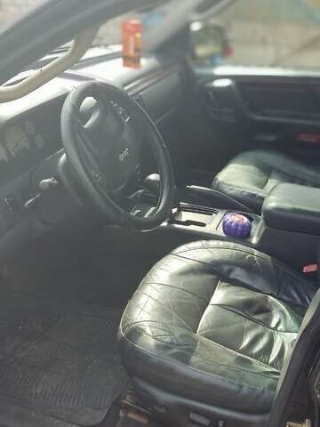 Черный Джип Гранд Чероки, объемом двигателя 2.7 л и пробегом 250 тыс. км за 5600 $, фото 3 на Automoto.ua