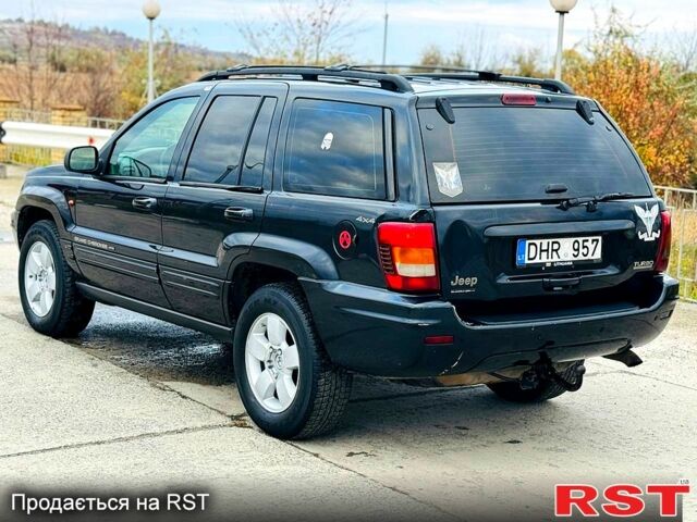 Джип Гранд Чероки 2003 в Новомосковске на Automoto.ua Черный Джип Гранд Чероки, объемом двигателя 3 л и пробегом 204 тыс. км за 3670 $, фото 2 на Automoto.ua