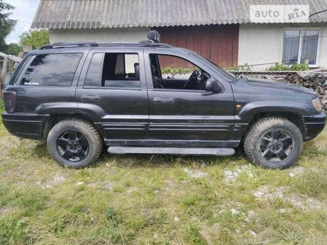 Чорний Джип Grand Cherokee, об'ємом двигуна 2.7 л та пробігом 240 тис. км за 10500 $, фото 1 на Automoto.ua