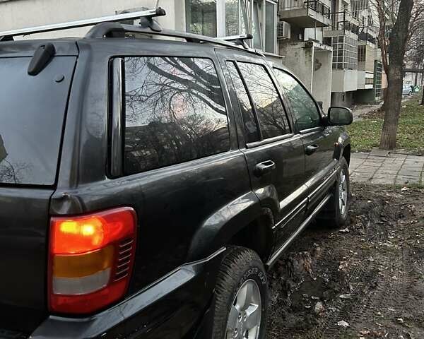 Джип Гранд Чероки 2003 в Измаиле на Automoto.ua Черный Джип Гранд Чероки, объемом двигателя 2.7 л и пробегом 370 тыс. км за 8500 $, фото 9 на Automoto.ua