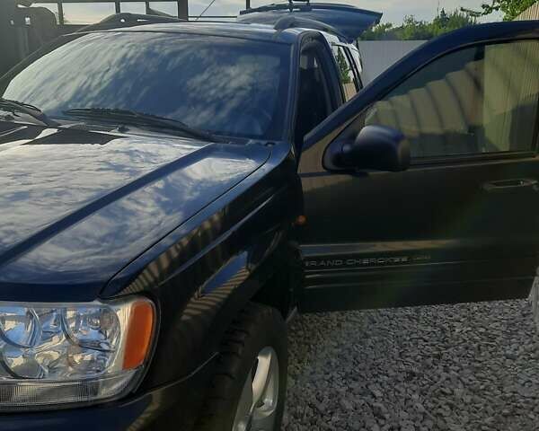 Черный Джип Гранд Чероки, объемом двигателя 2.69 л и пробегом 240 тыс. км за 9000 $, фото 12 на Automoto.ua