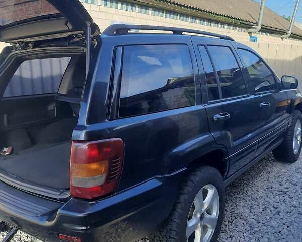 Черный Джип Гранд Чероки, объемом двигателя 2.69 л и пробегом 240 тыс. км за 9000 $, фото 16 на Automoto.ua