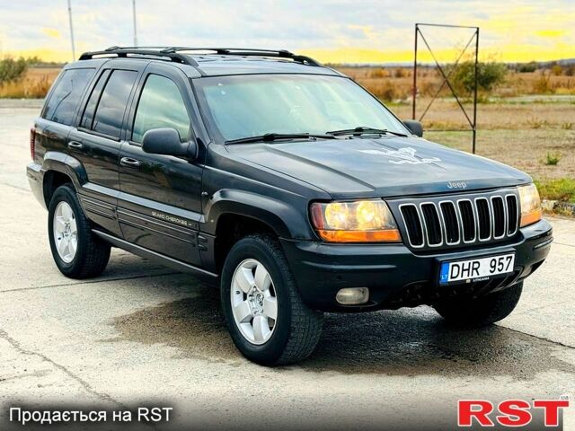 Джип Гранд Чероки 2003 в Новомосковске на Automoto.ua Черный Джип Гранд Чероки, объемом двигателя 3 л и пробегом 204 тыс. км за 3670 $, фото 1 на Automoto.ua