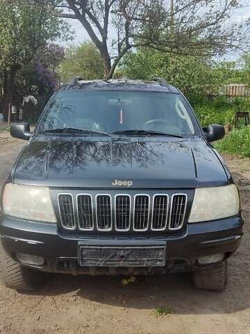 Черный Джип Гранд Чероки, объемом двигателя 2.7 л и пробегом 250 тыс. км за 5600 $, фото 2 на Automoto.ua