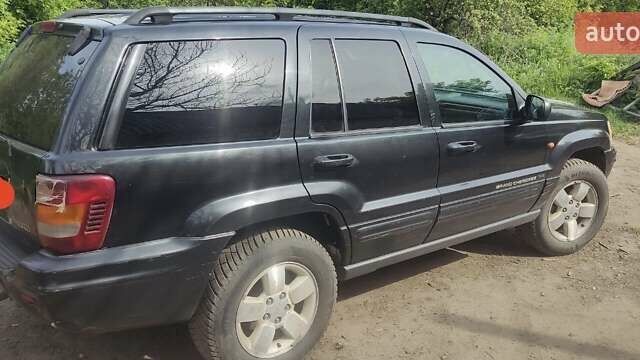 Черный Джип Гранд Чероки, объемом двигателя 2.7 л и пробегом 250 тыс. км за 5600 $, фото 5 на Automoto.ua