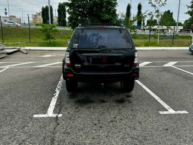 Черный Джип Гранд Чероки, объемом двигателя 2.7 л и пробегом 3 тыс. км за 4500 $, фото 4 на Automoto.ua