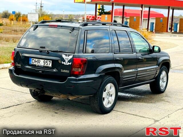 Джип Гранд Чероки 2003 в Новомосковске на Automoto.ua Черный Джип Гранд Чероки, объемом двигателя 3 л и пробегом 204 тыс. км за 3670 $, фото 3 на Automoto.ua