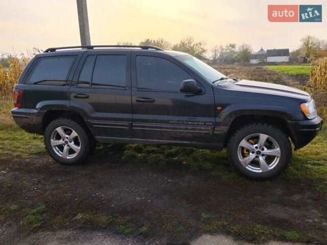 Черный Джип Гранд Чероки, объемом двигателя 2.69 л и пробегом 240 тыс. км за 9000 $, фото 2 на Automoto.ua
