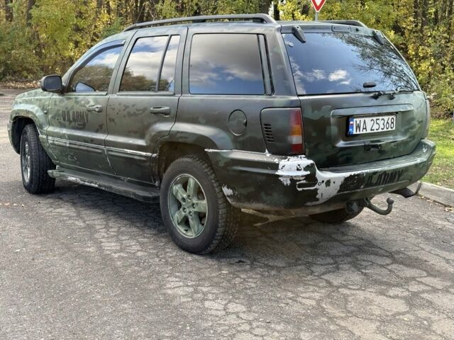 Джип Гранд Чероки 2004 в Изюме на Automoto.ua Черный Джип Гранд Чероки, объемом двигателя 2.7 л и пробегом 344 тыс. км за 4300 $, фото 4 на Automoto.ua