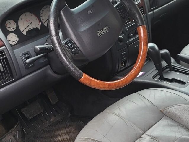 Черный Джип Гранд Чероки, объемом двигателя 2.7 л и пробегом 300 тыс. км за 5800 $, фото 3 на Automoto.ua