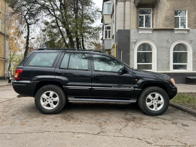 Черный Джип Гранд Чероки, объемом двигателя 2.7 л и пробегом 156 тыс. км за 6000 $, фото 5 на Automoto.ua