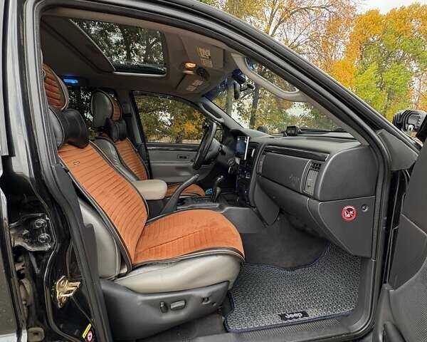 Чорний Джип Grand Cherokee, об'ємом двигуна 2.69 л та пробігом 364 тис. км за 10900 $, фото 30 на Automoto.ua