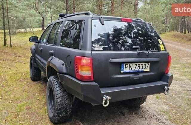 Черный Джип Гранд Чероки, объемом двигателя 0 л и пробегом 243 тыс. км за 4594 $, фото 6 на Automoto.ua