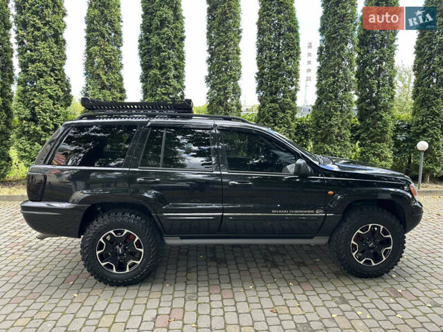 Чорний Джип Grand Cherokee, об'ємом двигуна 2.69 л та пробігом 286 тис. км за 16000 $, фото 12 на Automoto.ua
