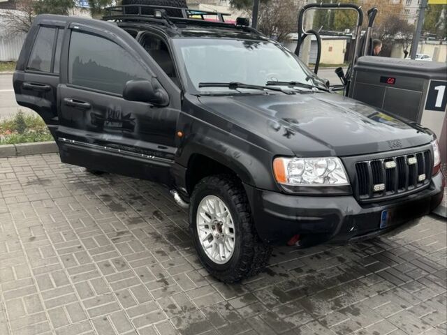 Черный Джип Гранд Чероки, объемом двигателя 2.7 л и пробегом 370 тыс. км за 6000 $, фото 1 на Automoto.ua