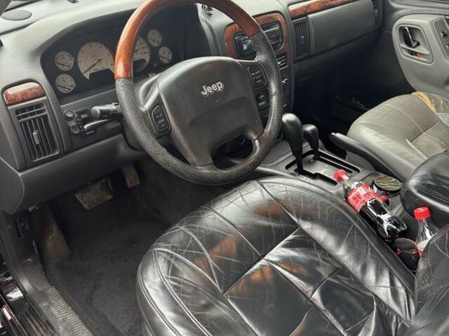 Черный Джип Гранд Чероки, объемом двигателя 2.7 л и пробегом 370 тыс. км за 6000 $, фото 7 на Automoto.ua