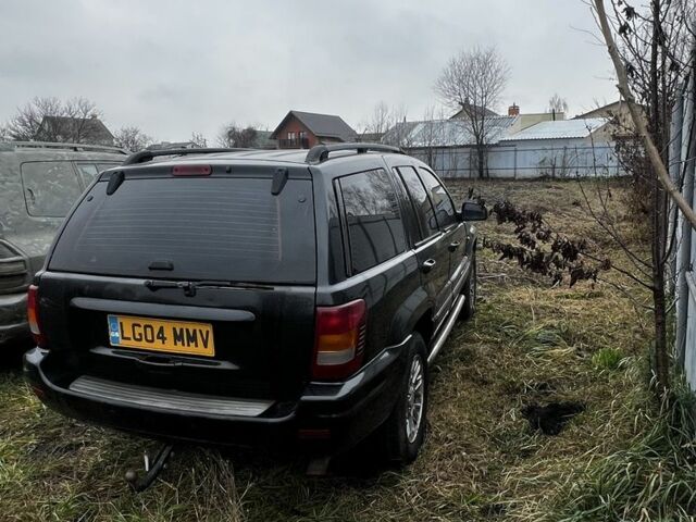 Черный Джип Гранд Чероки, объемом двигателя 2.7 л и пробегом 300 тыс. км за 2837 $, фото 3 на Automoto.ua