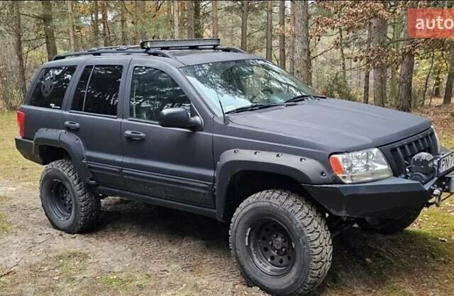 Черный Джип Гранд Чероки, объемом двигателя 0 л и пробегом 243 тыс. км за 4594 $, фото 2 на Automoto.ua