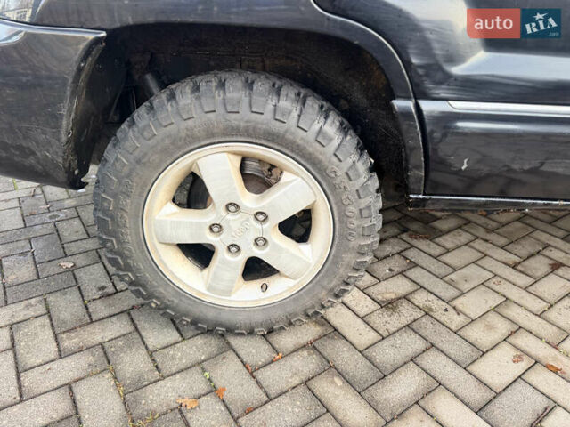 Черный Джип Гранд Чероки, объемом двигателя 2.7 л и пробегом 221 тыс. км за 3142 $, фото 14 на Automoto.ua