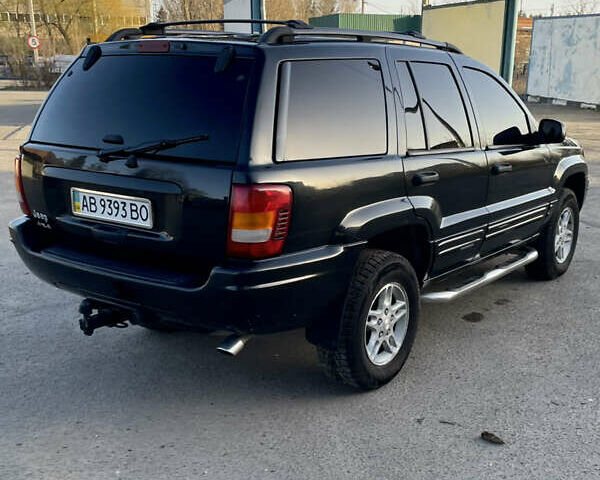 Чорний Джип Grand Cherokee, об'ємом двигуна 4 л та пробігом 120 тис. км за 5900 $, фото 1 на Automoto.ua