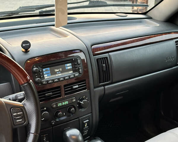 Джип Гранд Чероки 2004 в Иршава на Automoto.ua Черный Джип Гранд Чероки, объемом двигателя 2.7 л и пробегом 300 тыс. км за 8500 $, фото 16 на Automoto.ua