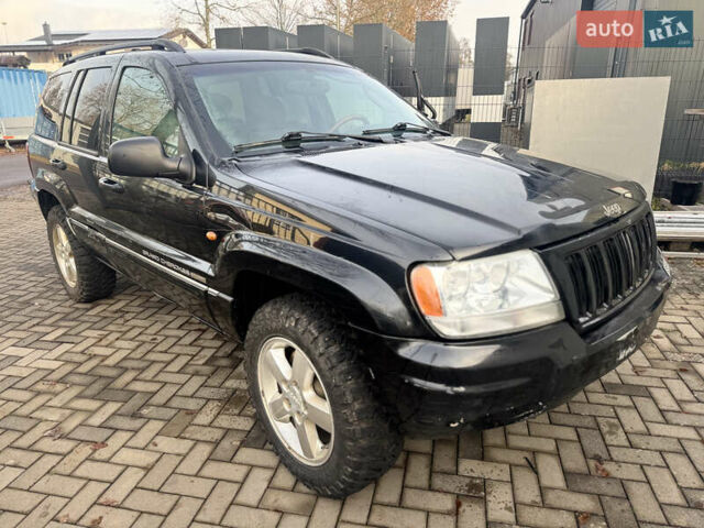 Черный Джип Гранд Чероки, объемом двигателя 2.7 л и пробегом 221 тыс. км за 3142 $, фото 3 на Automoto.ua