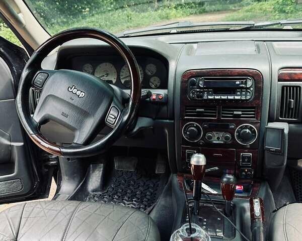 Чорний Джип Grand Cherokee, об'ємом двигуна 2.69 л та пробігом 270 тис. км за 6300 $, фото 22 на Automoto.ua