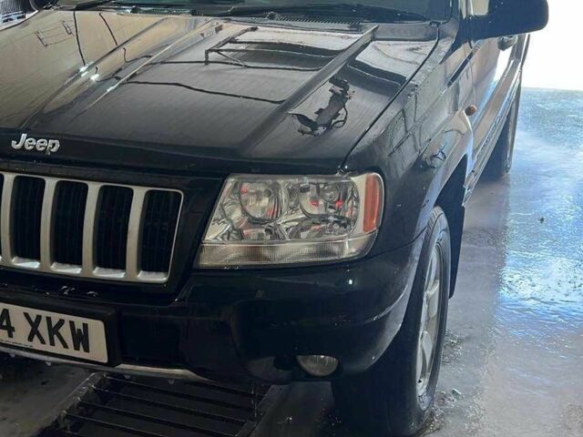 Джип Гранд Чероки 2004 в Харькове на Automoto.ua Черный Джип Гранд Чероки, объемом двигателя 2.7 л и пробегом 200 тыс. км за 4797 $, фото 1 на Automoto.ua