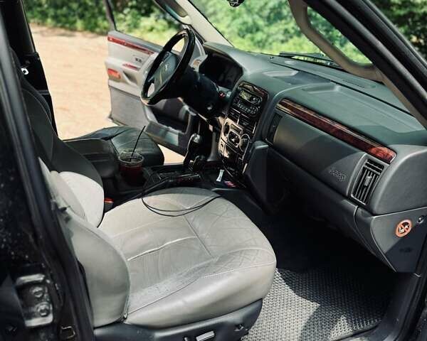Чорний Джип Grand Cherokee, об'ємом двигуна 2.69 л та пробігом 270 тис. км за 6300 $, фото 27 на Automoto.ua