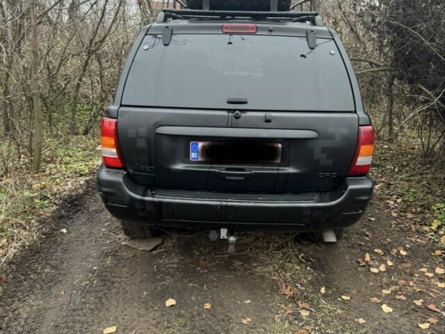 Черный Джип Гранд Чероки, объемом двигателя 2.7 л и пробегом 370 тыс. км за 6000 $, фото 3 на Automoto.ua