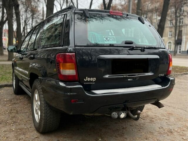 Черный Джип Гранд Чероки, объемом двигателя 2.7 л и пробегом 156 тыс. км за 6000 $, фото 2 на Automoto.ua