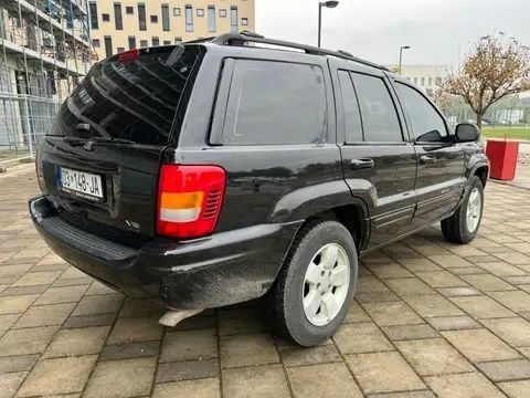 Черный Джип Гранд Чероки, объемом двигателя 2.7 л и пробегом 265 тыс. км за 3200 $, фото 4 на Automoto.ua