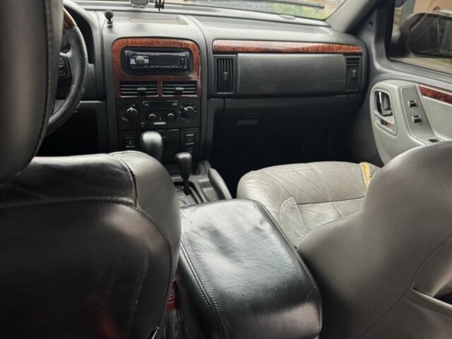 Черный Джип Гранд Чероки, объемом двигателя 2.7 л и пробегом 370 тыс. км за 6000 $, фото 8 на Automoto.ua